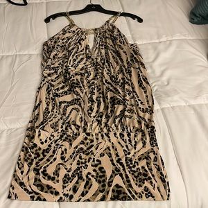 NWT Leopard print mini dress size large with peekaboo opening in the front